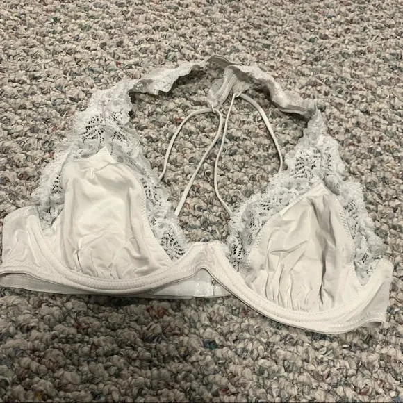 White lace trimmed underwire cross back bralette